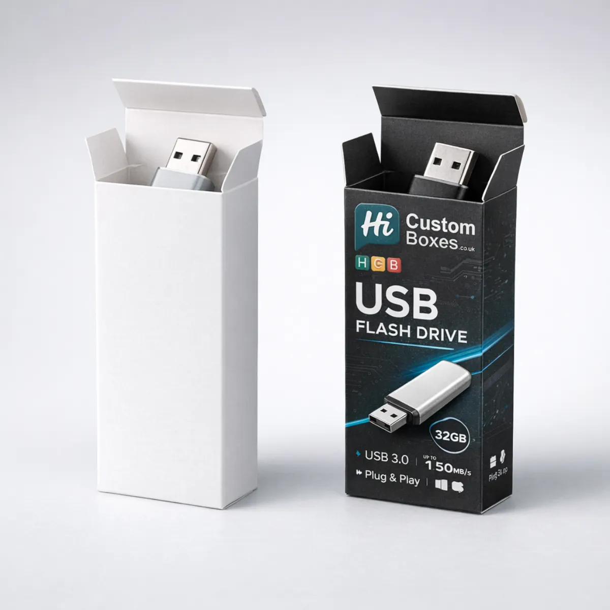 Two upright tuck-end boxes with top flaps open, displaying a silver USB drive inside each custom-printed pack. class=